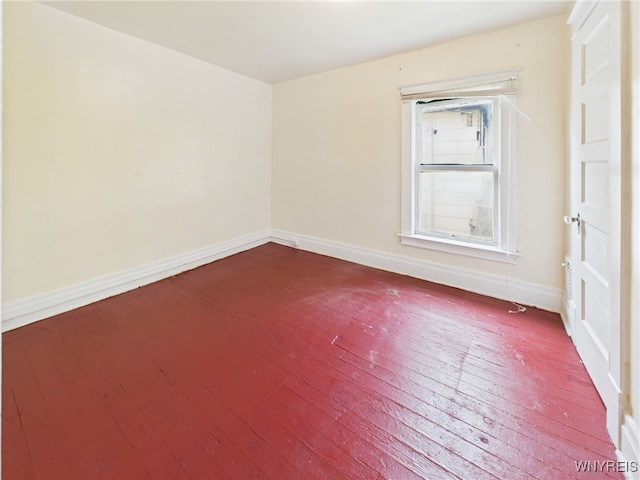 465 10th St, Niagara Falls, NY 14303 - spare room with dark wood-style flooring and baseboards