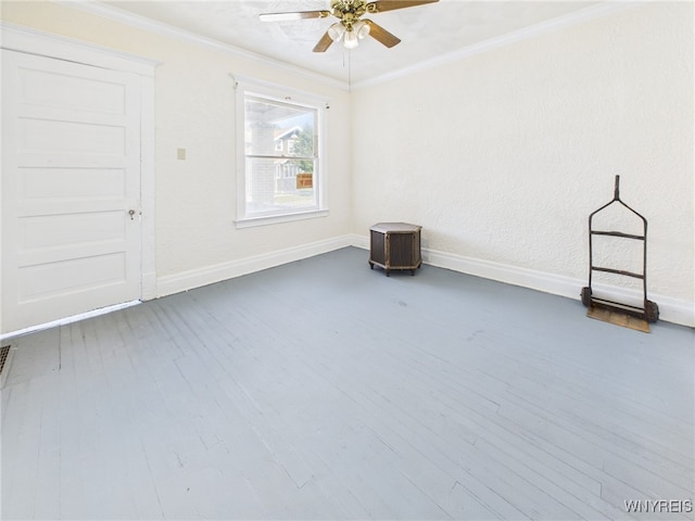 465 10th St, Niagara Falls, NY 14303 - spare room with baseboards, ceiling fan, crown molding, and wood finished floors