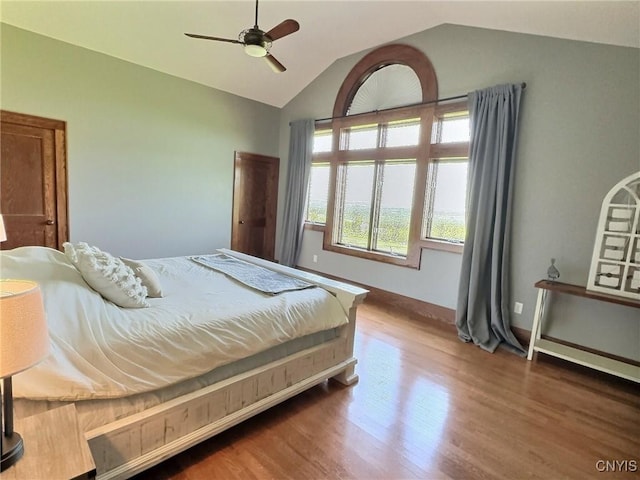 7294 Chase Rd, Pompey, NY 13063 - bedroom with wood finished floors, vaulted ceiling, ceiling fan, and baseboards