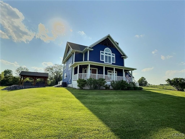 7294 Chase Rd, Pompey, NY 13063 - view of front facade featuring covered porch, a front yard, a gazebo, and central air condition unit