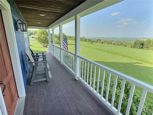 7294 Chase Rd, Pompey, NY 13063 - wooden porch featuring a yard