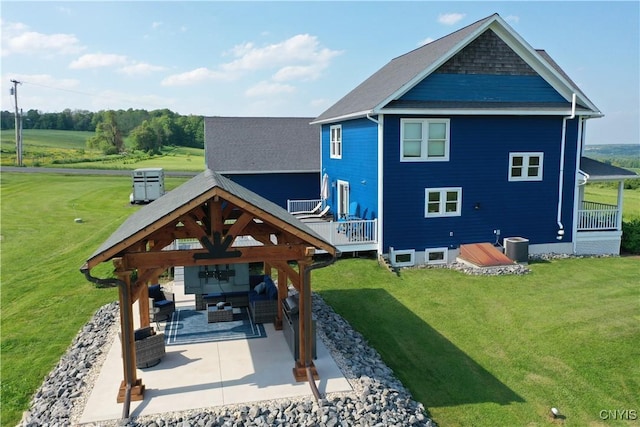 7294 Chase Rd, Pompey, NY 13063 - back of house with a gazebo, outdoor lounge area, a lawn, and a patio area