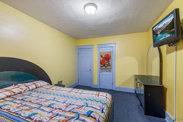 2238 Independence Ave, Niagara Falls, NY 14301 - carpeted bedroom with a textured ceiling and baseboards