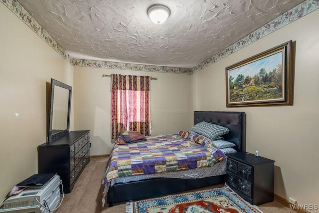 2238 Independence Ave, Niagara Falls, NY 14301 - carpeted bedroom with a textured ceiling and baseboards
