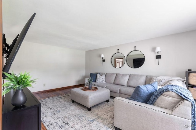 4292 Persimmon, Clay, NY 13090 - living area featuring wood finished floors and baseboards