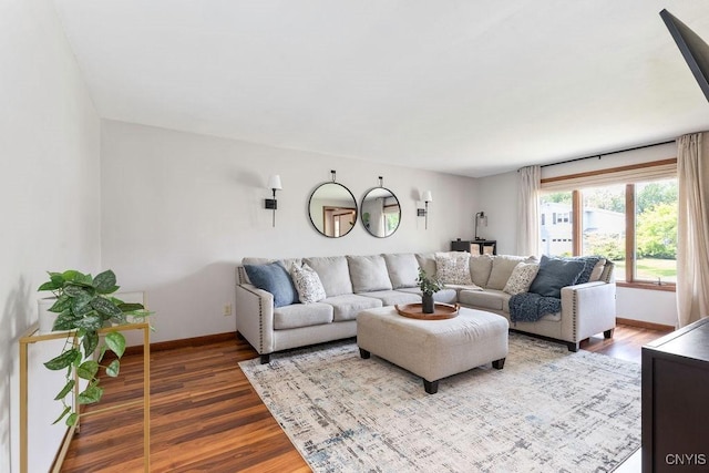 4292 Persimmon, Clay, NY 13090 - living area featuring wood finished floors and baseboards