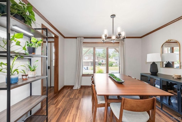 4292 Persimmon, Clay, NY 13090 - dining room featuring crown molding, a chandelier, plenty of natural light, wood finished floors, and baseboards