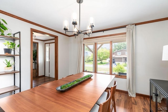 4292 Persimmon, Clay, NY 13090 - dining room featuring a chandelier, ornamental molding, baseboards, and wood finished floors