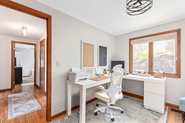 4292 Persimmon, Clay, NY 13090 - home office featuring light wood finished floors and baseboards