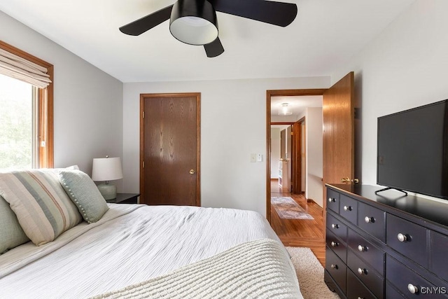 4292 Persimmon, Clay, NY 13090 - bedroom featuring wood finished floors, a closet, and a ceiling fan