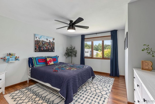4292 Persimmon, Clay, NY 13090 - bedroom with wood finished floors, baseboards, and a ceiling fan