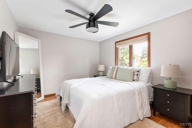 4292 Persimmon, Clay, NY 13090 - bedroom with wood finished floors and ceiling fan