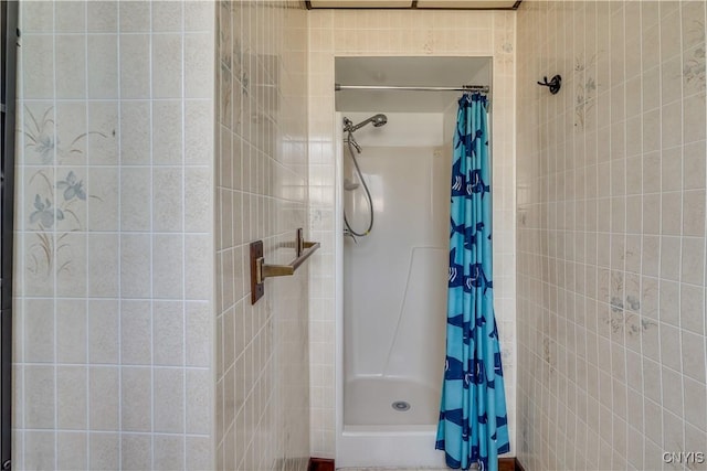 25 Waid St, Gouverneur, NY 13642 - full bathroom with a shower with shower curtain and tile walls