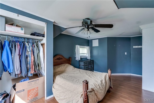 25 Waid St, Gouverneur, NY 13642 - bedroom featuring wood finished floors, ornamental molding, baseboards, and a ceiling fan