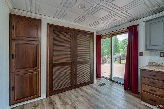 25 Waid St, Gouverneur, NY 13642 - entryway featuring an ornate ceiling, light wood-style floors, and recessed lighting