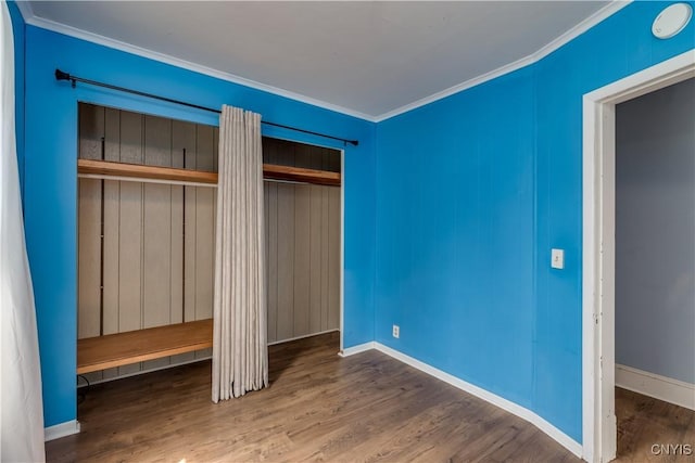 25 Waid St, Gouverneur, NY 13642 - unfurnished bedroom with crown molding, wood finished floors, and baseboards