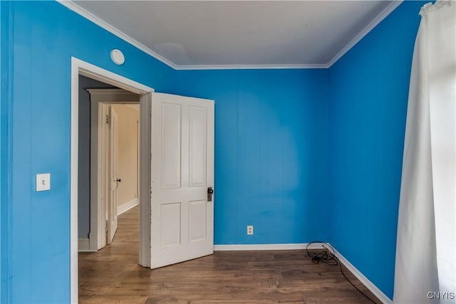 25 Waid St, Gouverneur, NY 13642 - spare room featuring ornamental molding, wood finished floors, and baseboards