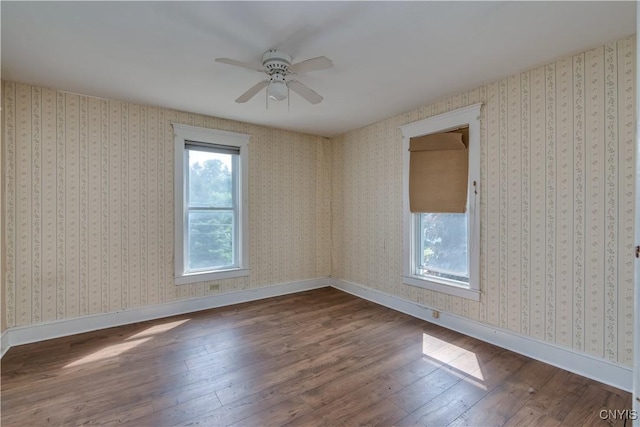 25 Waid St, Gouverneur, NY 13642 - unfurnished room featuring wood-type flooring, a ceiling fan, and baseboards