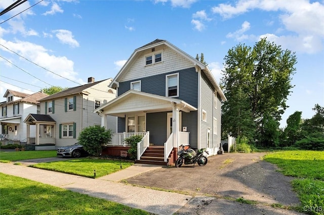 817 Mildred Ave, Utica, NY 13502 - traditional style home with a porch and a front yard