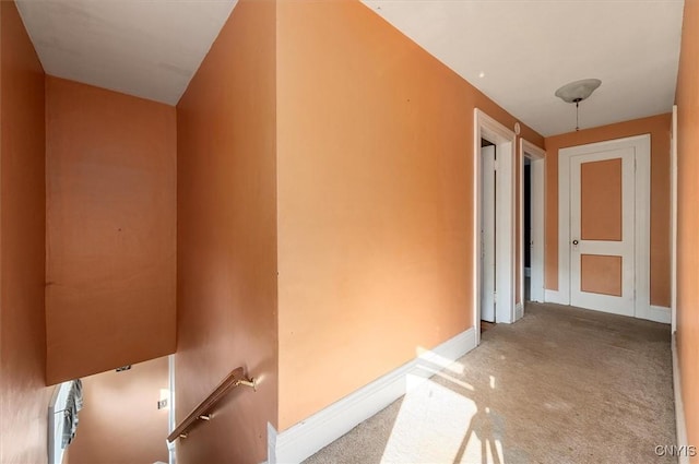 817 Mildred Ave, Utica, NY 13502 - hall with carpet flooring, an upstairs landing, and baseboards