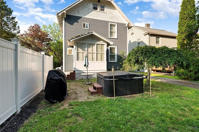 817 Mildred Ave, Utica, NY 13502 - back of house featuring a hot tub