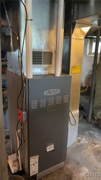 817 Mildred Ave, Utica, NY 13502 - utility room with heating unit
