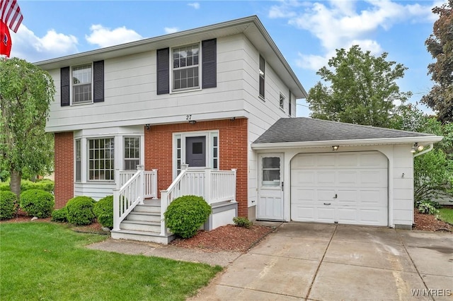 27 Lynn Lea St, Amherst, NY 14221 - colonial house featuring a garage, concrete driveway, a front yard, and brick siding