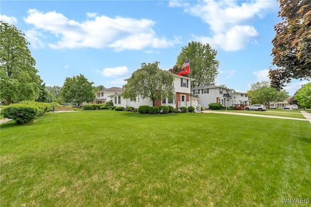 27 Lynn Lea St, Amherst, NY 14221 - view of front of home with a front lawn and a chimney