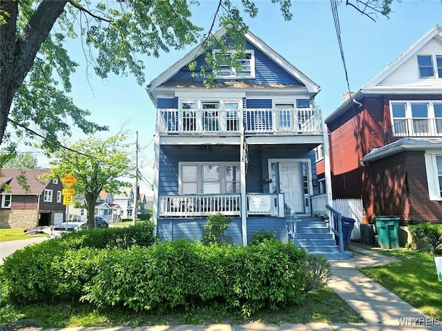 472 Leroy Ave, Buffalo, NY 14215 - view of front facade featuring covered porch and a balcony
