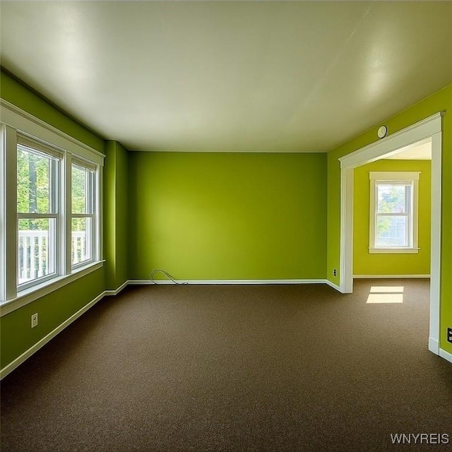 472 Leroy Ave, Buffalo, NY 14215 - spare room with dark colored carpet