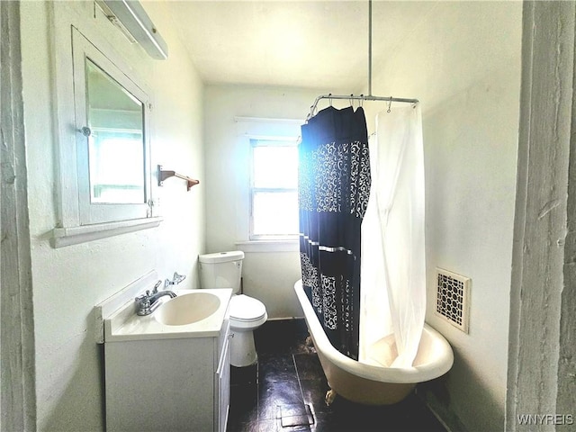 472 Leroy Ave, Buffalo, NY 14215 - bathroom with vanity, a shower with curtain, and a bath