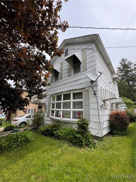 51 Wilson St, Salamanca-City, NY 14779 - view of front of house with a front lawn