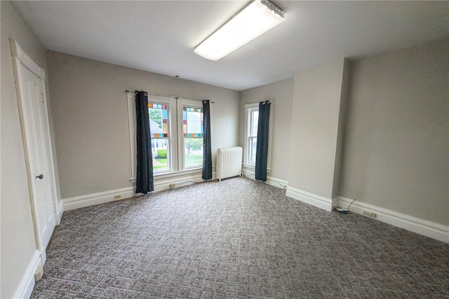 5 Gansevoort St, Bath, NY 14810 - spare room with radiator, carpet flooring, and baseboards