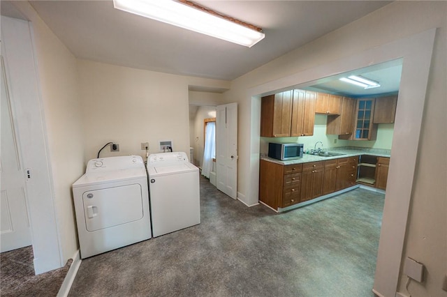 5 Gansevoort St, Bath, NY 14810 - laundry room with washing machine and clothes dryer and dark colored carpet