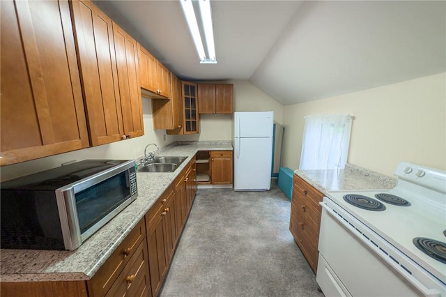 5 Gansevoort St, Bath, NY 14810 - kitchen featuring white appliances, a sink, lofted ceiling, and brown cabinets