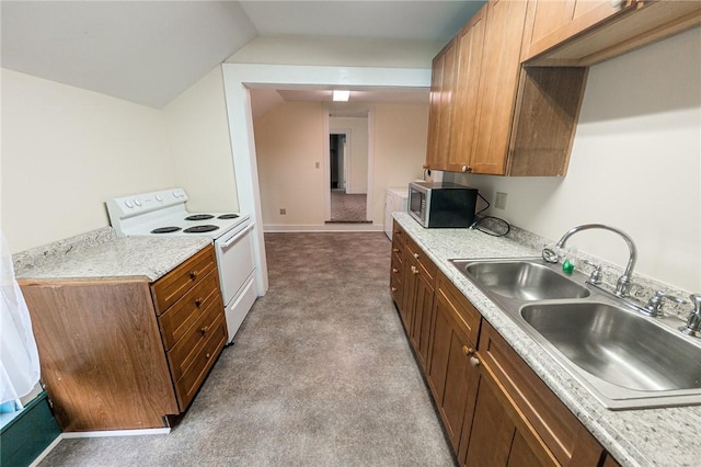 5 Gansevoort St, Bath, NY 14810 - kitchen featuring electric stove, stainless steel microwave, a sink, light countertops, and vaulted ceiling