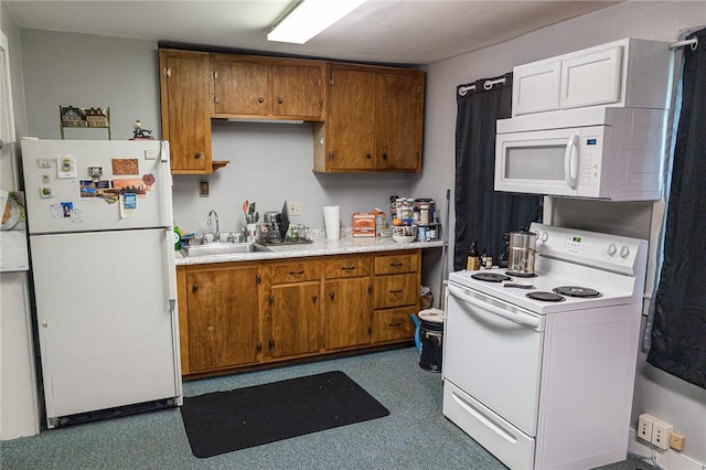 5 Gansevoort St, Bath, NY 14810 - kitchen with white appliances, a sink, light countertops, and brown cabinetry