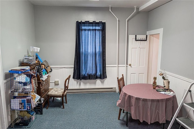 5 Gansevoort St, Bath, NY 14810 - carpeted dining room featuring wainscoting and a baseboard radiator