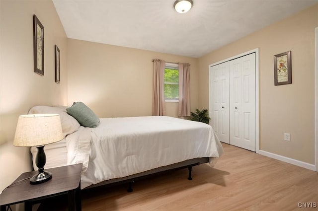 1 Christopher Cir, New Hartford, NY 13413 - bedroom featuring wood finished floors, baseboards, and a closet