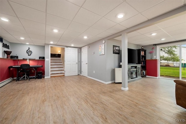 1 Christopher Cir, New Hartford, NY 13413 - living area with a drop ceiling, wood finished floors, baseboards, stairs, and a desk