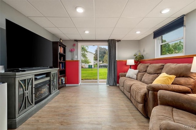 1 Christopher Cir, New Hartford, NY 13413 - living area featuring light wood-type flooring, a paneled ceiling, baseboards, and recessed lighting