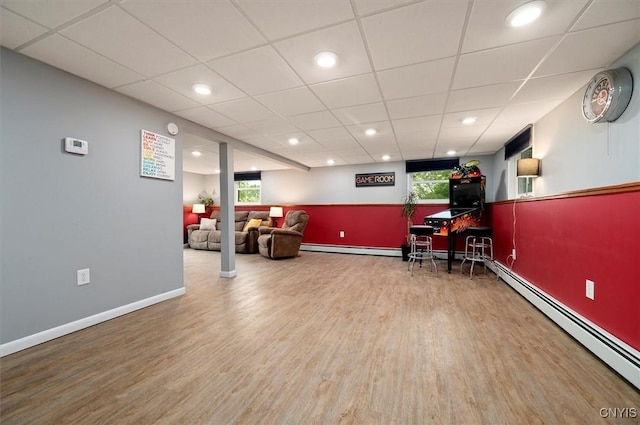 1 Christopher Cir, New Hartford, NY 13413 - game room with a baseboard heating unit, wood finished floors, baseboards, a paneled ceiling, and recessed lighting