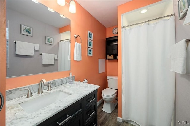 1 Christopher Cir, New Hartford, NY 13413 - bathroom featuring vanity, toilet, wood finished floors, baseboards, and curtained shower