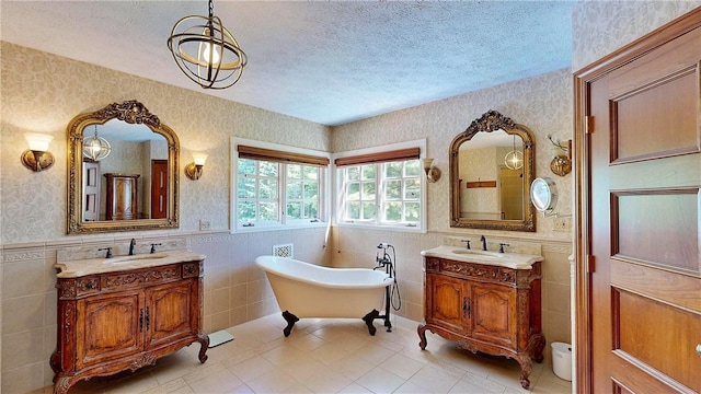 11 Sunrise Park, Pittsford, NY 14534 - bathroom with tile walls, wallpapered walls, a freestanding tub, tile patterned flooring, and wainscoting