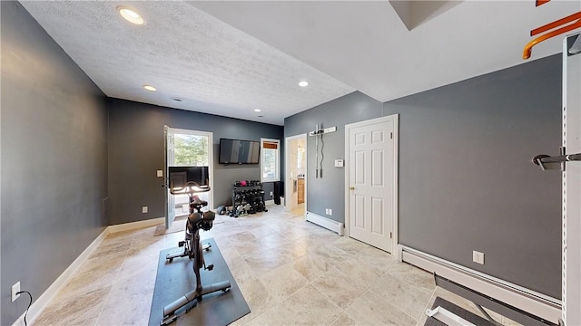 11 Sunrise Park, Pittsford, NY 14534 - exercise room with a baseboard heating unit, baseboards, recessed lighting, a textured ceiling, and a barn door