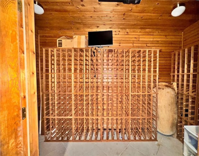 11 Sunrise Park, Pittsford, NY 14534 - wine cellar featuring wood ceiling, wooden walls, and tile patterned floors