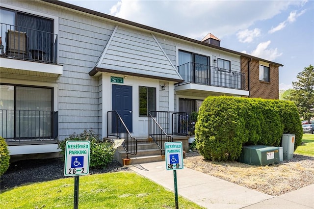26-8 Great Wood Ct, Perinton, NY 14450 - multi unit property featuring a balcony and a chimney
