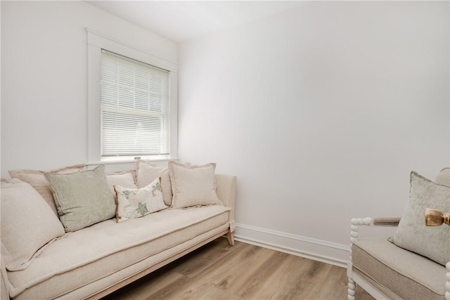 39 Sunnyside Dr, Elmira, NY 14905 - sitting room with light wood-style floors and baseboards