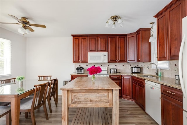 39 Sunnyside Dr, Elmira, NY 14905 - kitchen with white appliances, a sink, healthy amount of natural light, and a ceiling fan