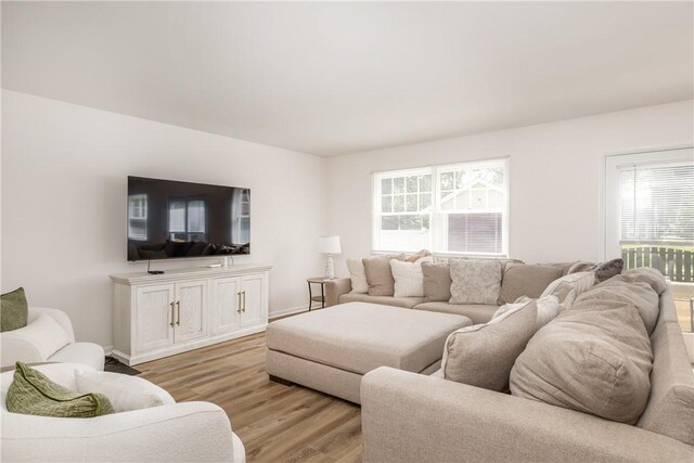 39 Sunnyside Dr, Elmira, NY 14905 - living room with plenty of natural light and light wood-style flooring